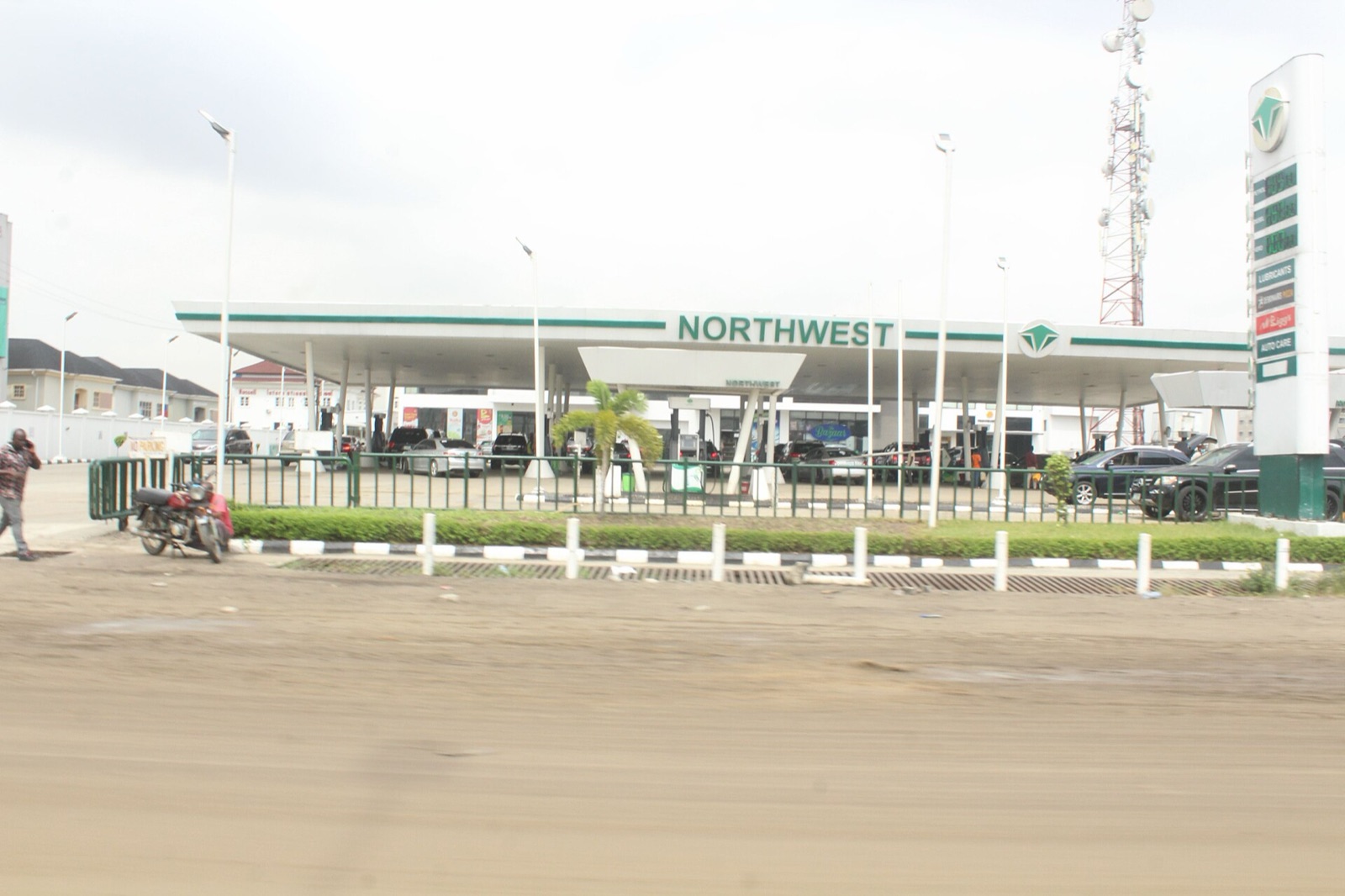 A Northwest petrol station forecourt beside the Lekki–Epe Expressway in Lagos