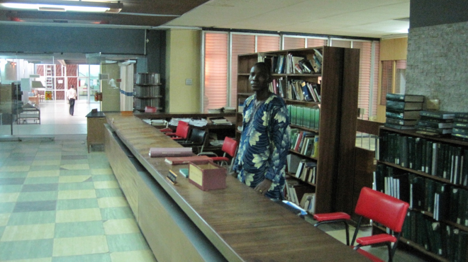 Bookshelves and a long reading counter inside the Kenneth Dike Library at the University of Ibadan